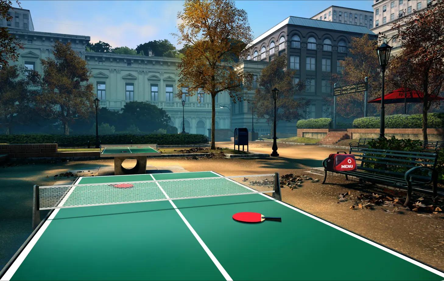Green ping pong table in a park with historic buildings